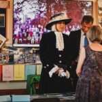 High sheriff of Hertford admiring display at 150th anniversary party